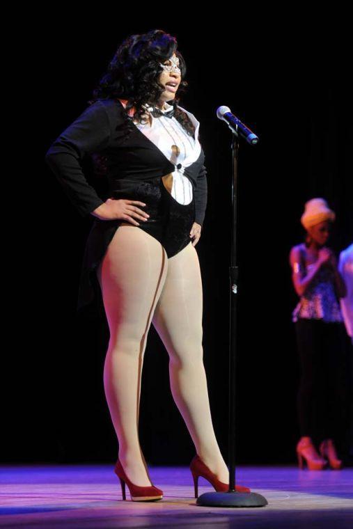 Kinesiology sophomore Bria Craige speaks to the audience Tuesday, Feb. 4, 2014 during the Mister and Miss Imani Scholarship Pageant: “A Walk in Their Shoes…” in the LSU Union Theatre.