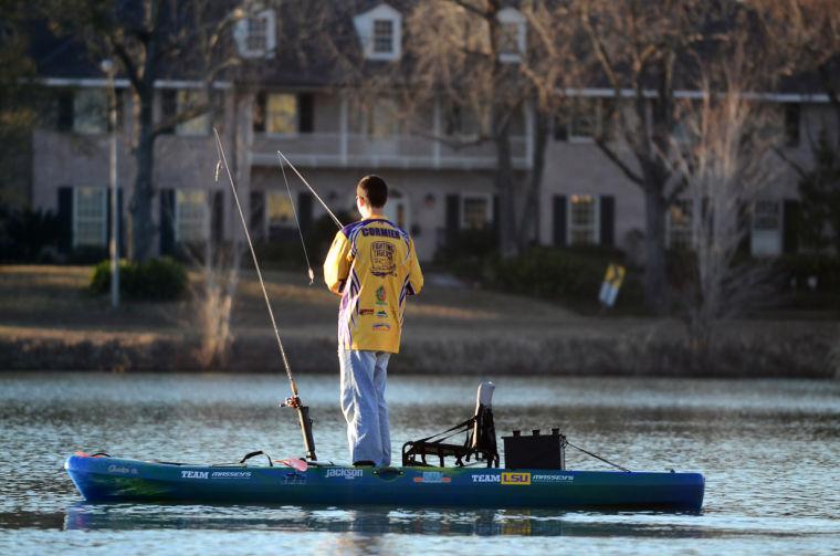 LSU Kayak Fishing Club member, Jacob Cormier, fishing from his kayak on the Milford Wampold Memorial Park Lake.