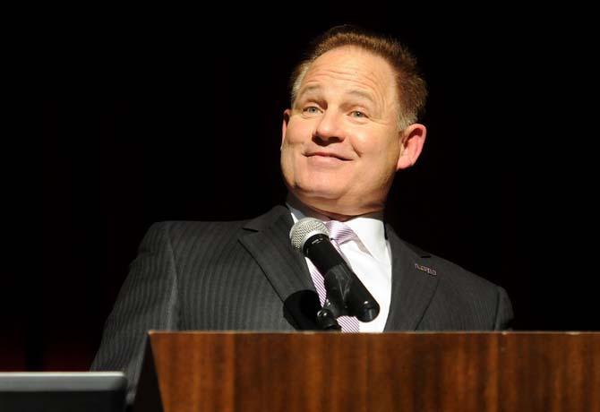 LSU head football coach Les Miles glances at the audience Wednesday, Feb. 5, 2014 at Bayou Bash in L'Auberge Casino.