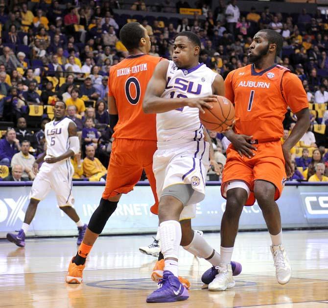 LSU freshman forward Jarell Martin (12) drives toward the goal Saturday, Feb. 8, 2013 during the Tigers' 87-80 victory against Auburn Tigers in the PMAC.