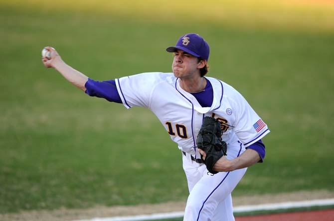 LSU junior right handed pitcher Aaron Nola (10) pitches the ball Friday, Jan. 31, 2014 during practice at Alex Box Stadium.