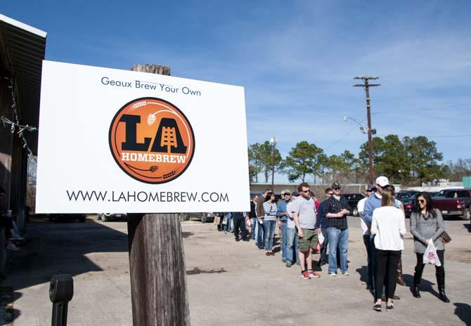 Patrons form a line Saturday, Feb. 15, 2014 during the 2014 Brasseurs a la Maison Iron Brewer Festival at Tin Roof Brewing Company in Baton Rouge.