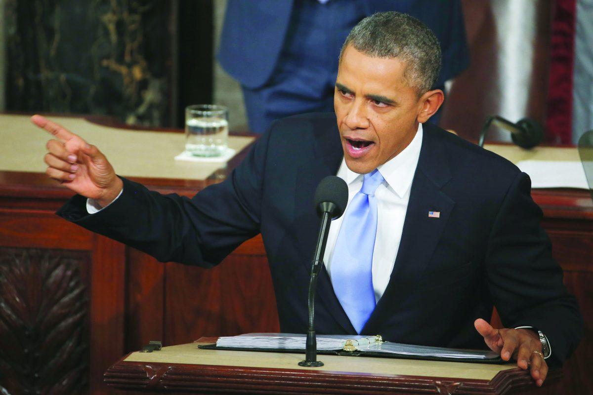 In this Jan. 28, 2014, photo President Barack Obama delivers his State of the Union address on Capitol Hill in Washington. A Democratic push to boost the federal minimum wage to $10.10 an hour is a long shot in Congress this election year, even after President Barack Obama made it a centerpiece of his State of the Union address. (AP Photo)