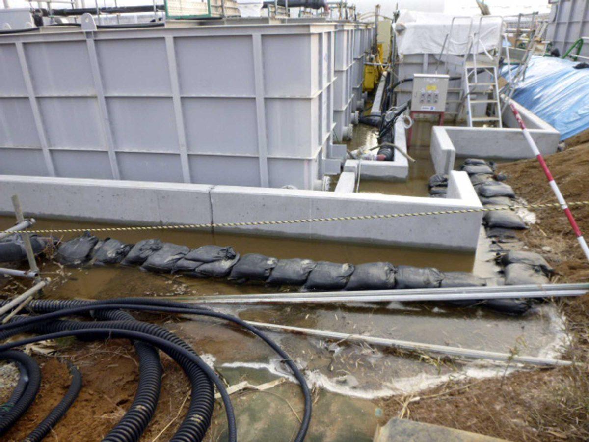 This photo released by Tokyo Electric Power Co. (TEPCO) shows radioactive water leaked from a tank at Fukushima Dai-ichi nuclear power plant in Okuma, Fukushima Prefecture Thursday, Feb. 20, 2014. Highly radioactive water has overflowed from a storage tank, but the operator says it did not reach the Pacific Ocean. The operator, TEPCO said Thursday that the leak involved partially treated water from early in the crisis, meaning it was more toxic than previous leaks. Three reactors melted at the Fukushima Dai-ichi plant following the 2011 earthquake and tsunami, with radioactive water partially recycled and stored in more than 1,000 tanks. (AP Photo/Tokyo Electric Power Co. )(AP Photo/Tokyo Electric Power Co. )