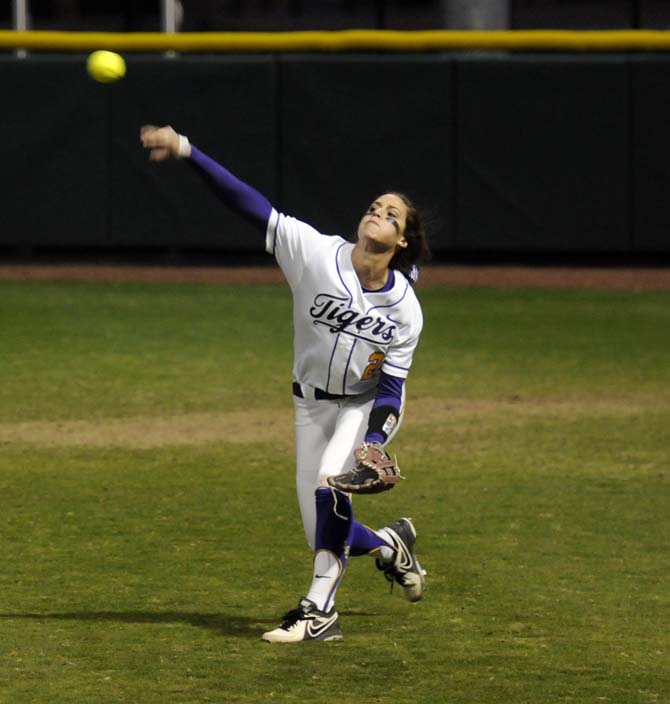 LSU freshman outfielder Bailey Landry (26) hurls the ball toward home plate Saturday, Feb. 15, 2015 dring the Tigers' 1-2 loss to South Alabama in Tiger Park.