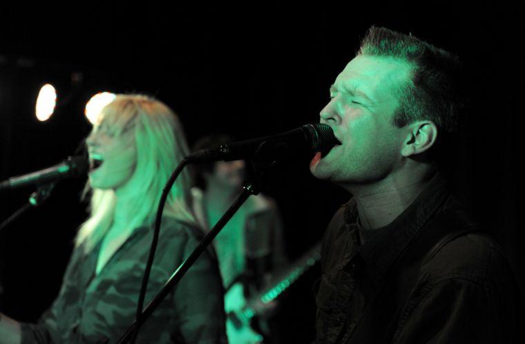 The Millburns vocalist and guitarist Ben Nelson and vocalist Ashley Cowart sing Thursday, January 23, 2014 at their rehearsal space in Baton Rouge.