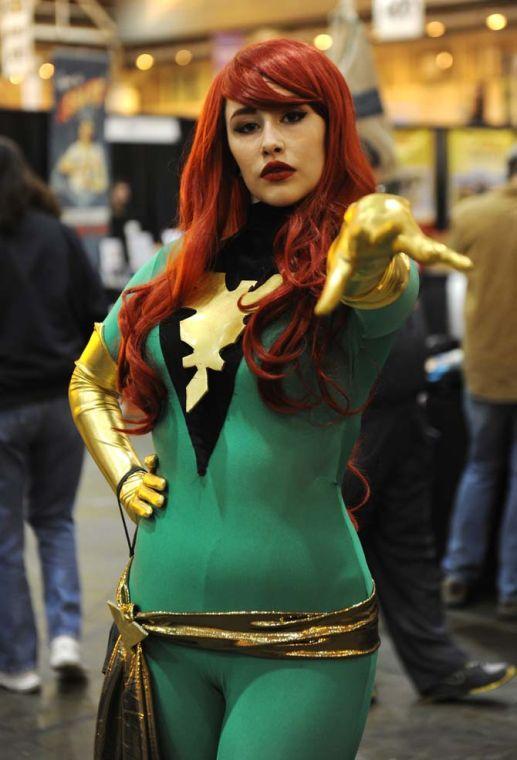 Mary Simmons cosplays as "Pheonix" Saturday, Feb. 8, 2014 at the Wizard World New Orleans Comic Con held at the New Orleans Convention Center.