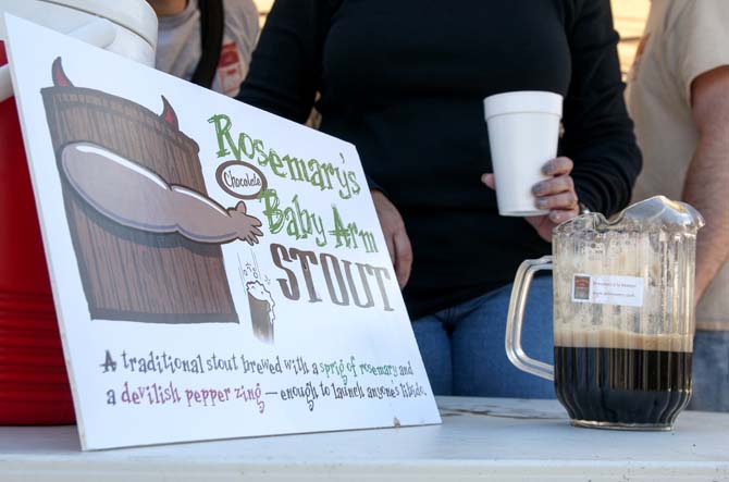 A decorative sign sits on display at a booth Saturday, Feb. 15, 2014 during the 2014 Brasseurs a la Maison Iron Brewer Festival at Tin Roof Brewing Company in Baton Rouge.