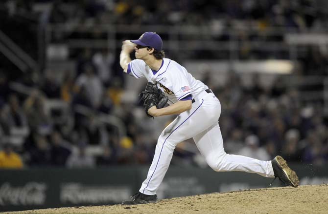 LSU junior pitcher Aaron Nola (10) fires one in Friday, Feb. 21, 2014 during the Tigers' 9-0 victory against Virginia Tech at Alex Box Stadium.