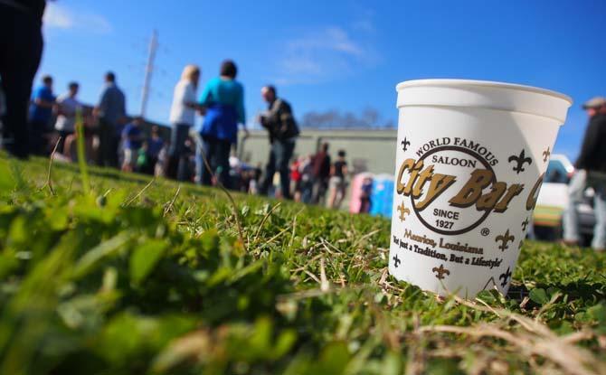 A beer sampling cup sits in the grass Saturday, Feb. 15, 2014 during the 2014 Brasseurs a la Maison Iron Brewer Festival at Tin Roof Brewing Company in Baton Rouge.