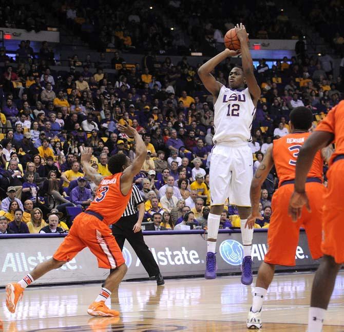 LSU freshman forward Jarell Martin (12) attempts a field goal Saturday, Feb. 8, 2013 during the Tigers' 87-80 victory against Auburn Tigers in the PMAC.