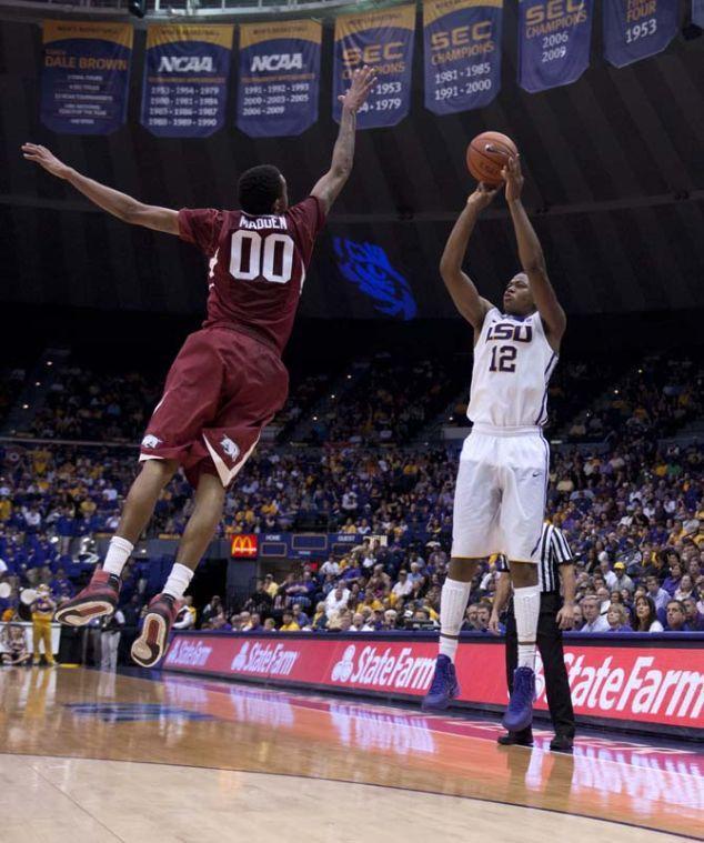 LSU freshman forward Jarell Martin (12) makes a shot Saturday, Feb. 2, 2014, during the Tigers' 88-74 victory against Arkansas in the PMAC.