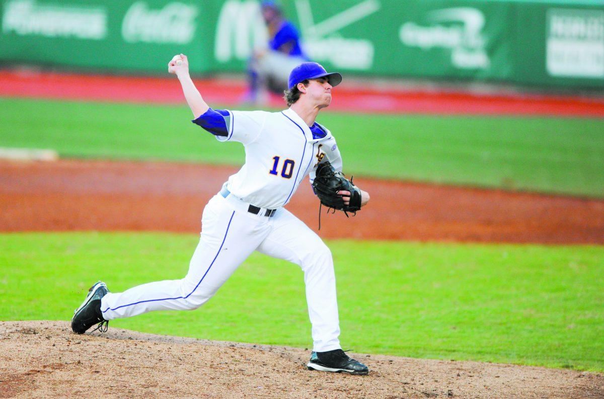 LSU junior right handed pitcher Aaron Nola (10) winds up before a pitch Friday, Jan. 31, 2014 during a scrimmage at Alex Box Stadium.