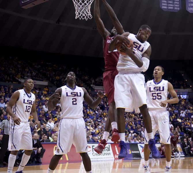 LSU senior forward Shavon Coleman (5) grabs a rebound Saturday, Feb. 2, 2014, during the Tigers' 88-74 victory against Arkansas in the PMAC.