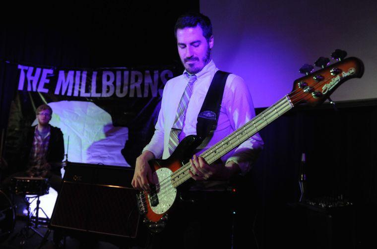 The Millburns bassist John Mark Lowry slaps the bass Thursday January 23, 2014 at the band's practice space in Baton Rouge.