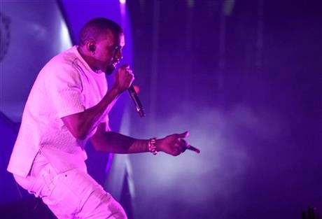 In this July 1, 2012 file photo, Kanye West performs at the BET Awards in Los Angeles. West&#8217;s new album &#8220;Yeezus&#8221; is an artsy, dark adventure that isn&#8217;t easy to digest. The 10 tracks are made up of moody, electronic and erratic beats, and lyrics about race and religion. (Photo by Matt Sayles/Invision/AP, File)