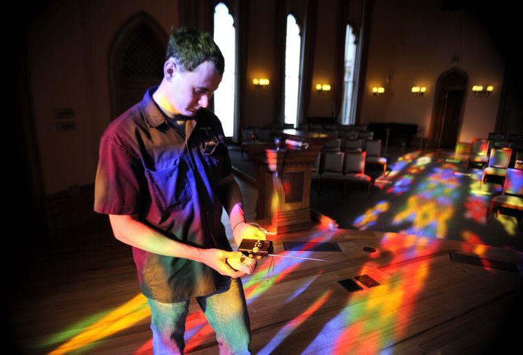 Martin DeLatte reads his EKG meter and his radio wave monitor for evidence of paranormal activity Friday afternoon, Feb. 14, 2014 in the Louisiana Old State Capitol.