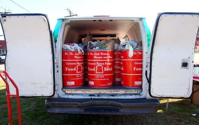 Barrels full of canned goods sit inside a van Saturday, Feb. 15, 2014 during the 2014 Brasseurs a la Maison Iron Brewer Festival at Tin Roof Brewing Company in Baton Rouge.