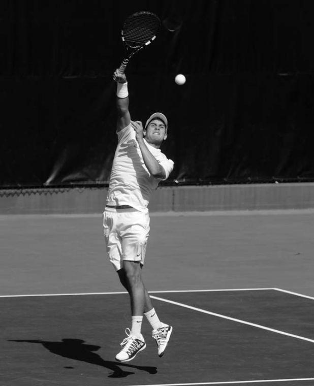 LSU freshman tennis player Justin Butsch prepares to hit the ball Sunday, Feb. 9, 2014 during the Tigers' 6-1 victory against Southern Miss in W.T. "Dub" Robinson Tennis Stadium.