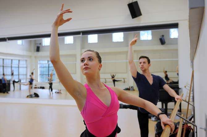 Members of River North Dance Chicago perform bar exercises Monday, Feb. 10, 2014, in the Music and Dramatic Arts Building.