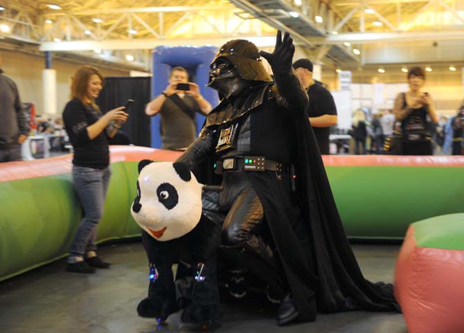 "Darth Vader" entertains the attendees Saturday, Feb. 8, 2014 at the Wizard World New Orleans Comic Con held at the New Orleans Convention Center.