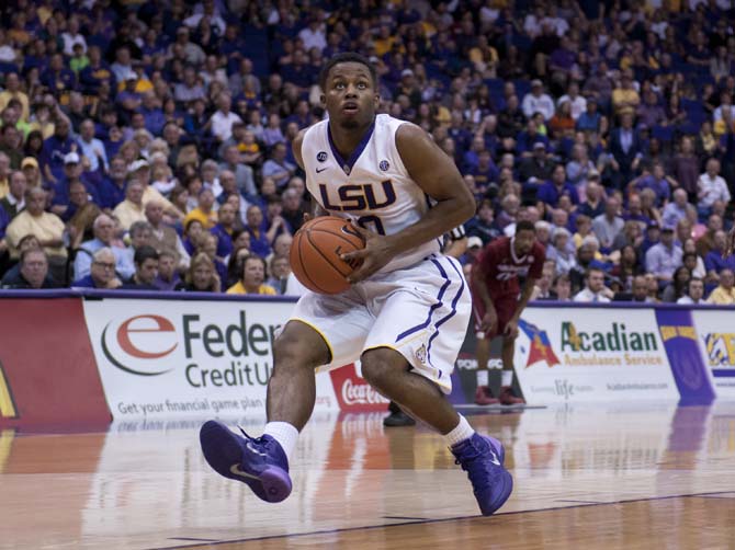 LSU senior guard Andre Stringer (10) runs toward the basket Saturday, Feb. 2, 2014, during the Tigers' 88-74 victory against Arkansas in the PMAC.