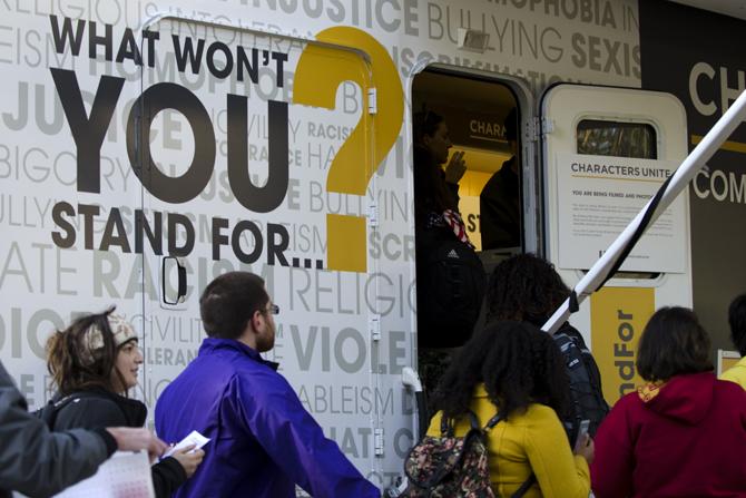 Students at LSU line up outside of USA's Characters Unite "I Won't Stand For..." campaign bus to stamp their own "I Won't Stand For..." t-shirt with choices ranging from Racism to Ableism.