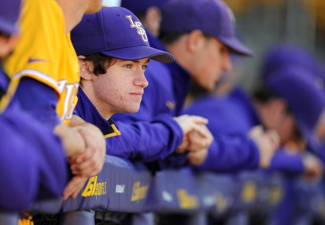 LSU freshman pitcher Mitchell Sewald watches Sunday, March 24, 2013 the 8-2 victory against Auburn at Alex Box Stadium.