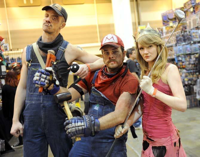 Cosplaying friends take a creative approach to "Luigi", "Mario", and "Princess Peach" Friday, Feb. 7, 2014, during Wizard World New Orleans Comic Con held at the New Orleans Convention Center.