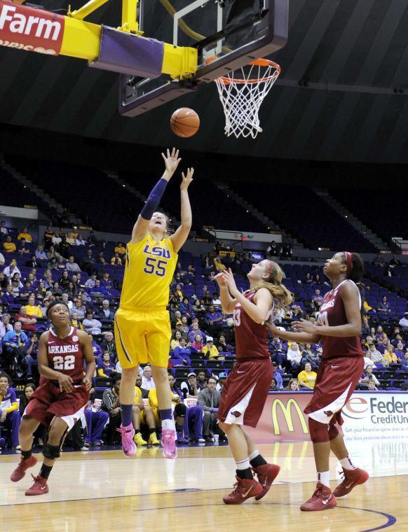 LSU senior forward Theresa Plaisance (55) takes a shot at the net Sunday, Feb. 23, 2014 during the Tigers' 57-53 loss against the Razorbacks in the Pete Maravich Assembly Center.