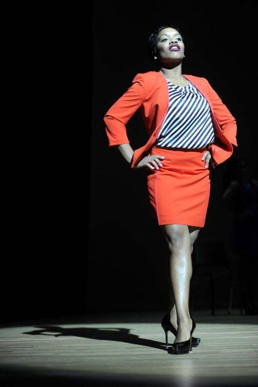 Communication disorders junior Alaysia Brown strikes a pose Tuesday, Feb. 4, 2014 during the Mister and Miss Imani Scholarship Pageant: “A Walk in Their Shoes…” in the LSU Union Theatre.