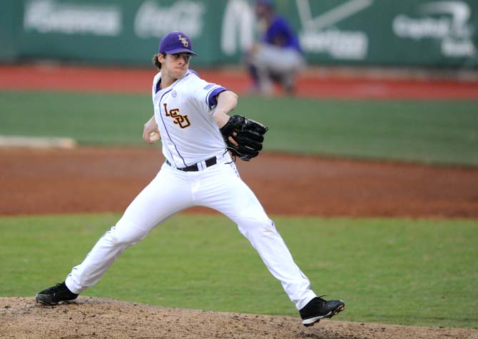 LSU junior right handed pitcher Aaron Nola (10) winds up before a pitch Friday, Jan. 31, 2014 during a scrimmage at Alex Box Stadium.