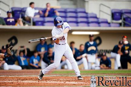 <p>LSU senior infielder Austin Nola (36) eyes a pitch March 20 during the Tigers’ 15-5 win against Southern University in Alex Box Stadium.</p>