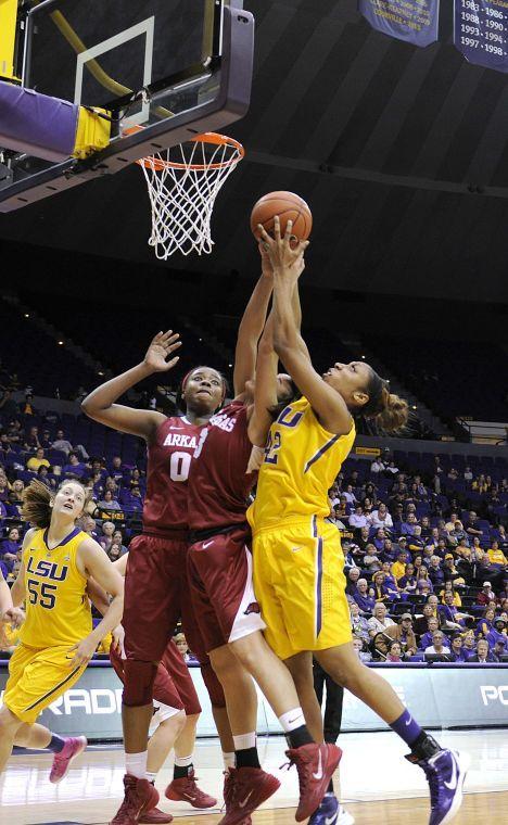 LSU junior forward Sheila Boykin (42) attempts a shot on the net Sunday, Feb. 23, 2014 during the Tigers' 57-53 loss against the Razorbacks in the Pete Maravich Assembly Center.