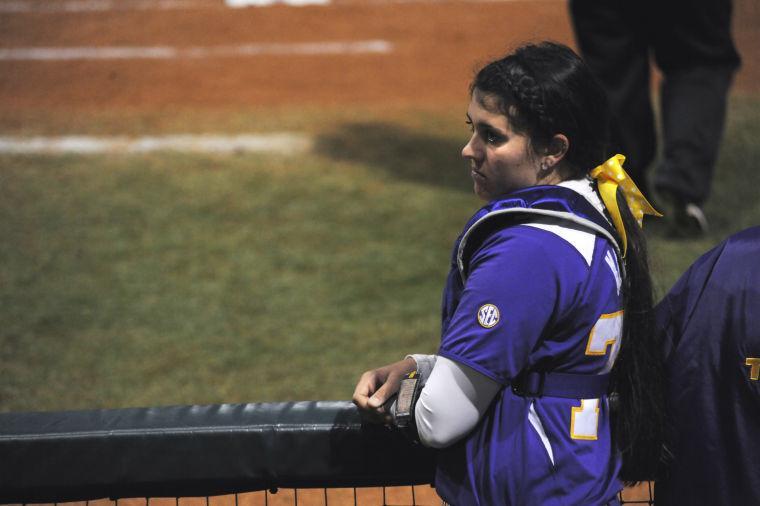 LSU sophomore catcher Kellsi McCasland looks on at her teammates as they attempt to catch up during their first match of the season Thursday, Feb. 6, 2014 against Texas. The Lady Tigers' were defeated by the Longhorns 6-1.