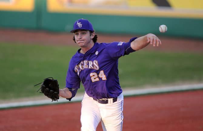 LSU junior left handed pitcher Cody Glenn (24) pitches the ball Friday, Jan. 31, 2014 during practice at Alex Box Stadium.