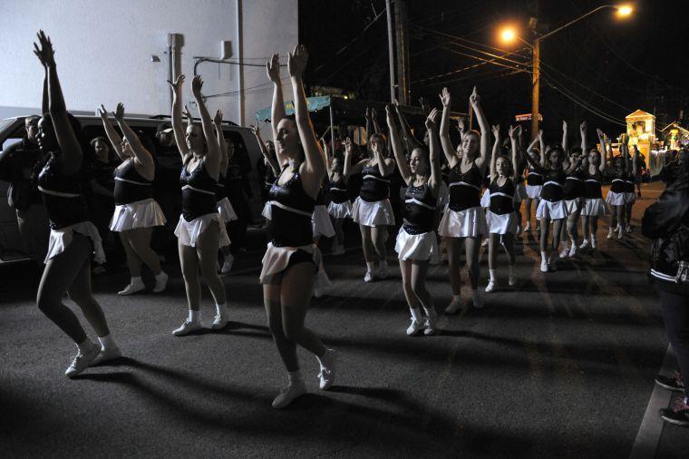 Dance Unlimited of the River Parishes marches in the Krewe of Orion Mardi Gras Parade on Saturday night, Feb. 22, 2014.