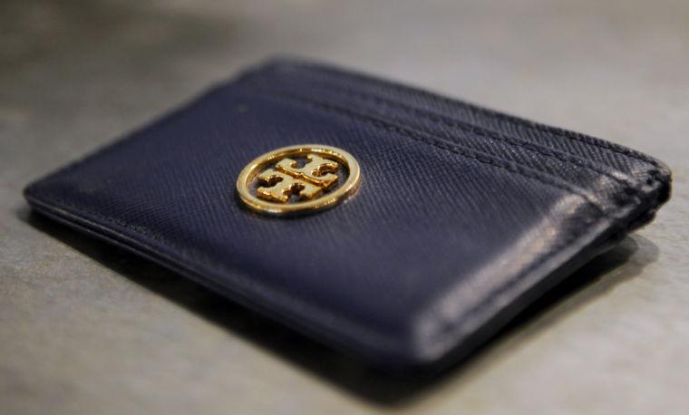 A small leather Tory Burch wallet.