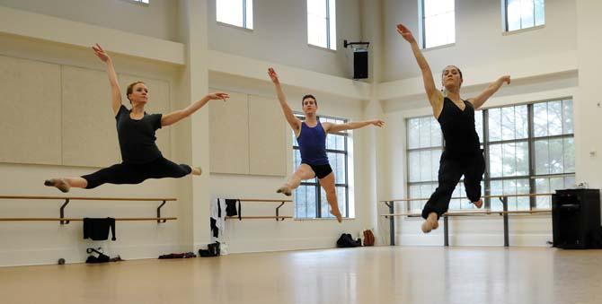 Members of River North Dance Chicago perform floor exercises Monday, Feb. 10, 2014, in the Music and Dramatic Arts Building.