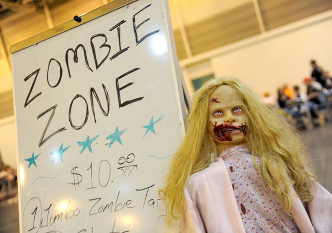 Zombie Zone is an area at the Wizard World New Orleans Comic Convention guests can practice their zombie apocalypse survival skills.