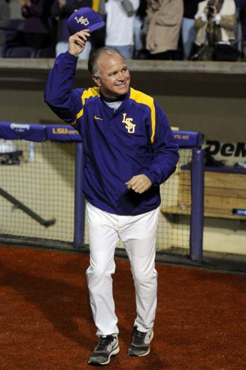 LSU head baseball coach Paul Mainieri waves to the crowd Friday, Feb. 14, 2014 before the Tigers' 2-0 win against UNO in Alex Box Stadium.