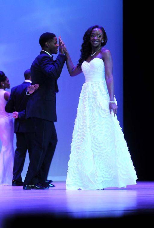 Broadcast journalism junior Kendra Turley showcases her evening gown Tuesday, Feb. 4, 2014 during the Mister and Miss Imani Scholarship Pageant: “A Walk in Their Shoes…” in the LSU Union Theatre.