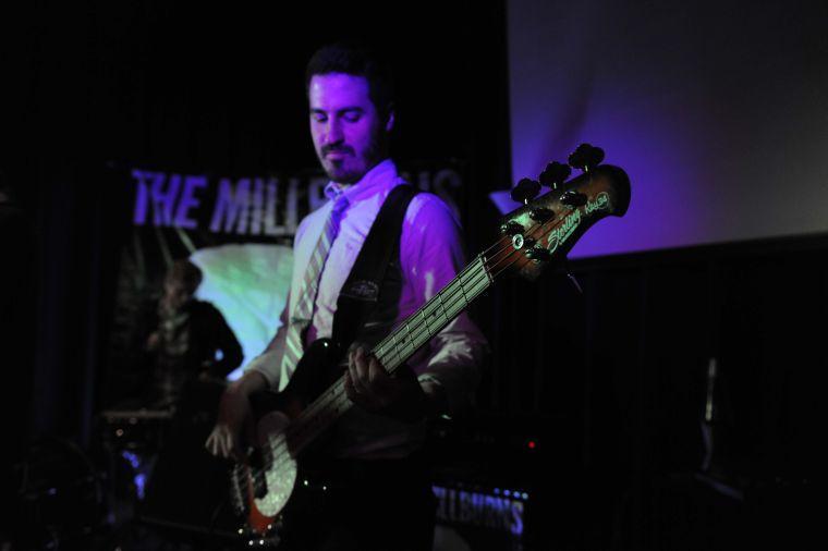 The Millburns bassist John Mark Lowry slaps the bass Thursday January 23, 2014 at the band's practice space in Baton Rouge.