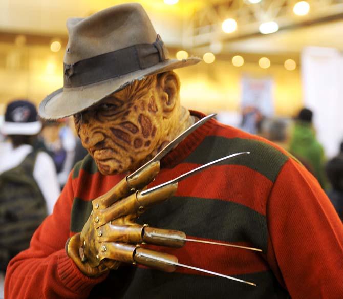 A Wizard World New Orleans Comic Con attendee cosplays "Freddy Krueger" Saturday, Feb. 8, 2014 at the weekend convention held at the New Orleans Convention Center.