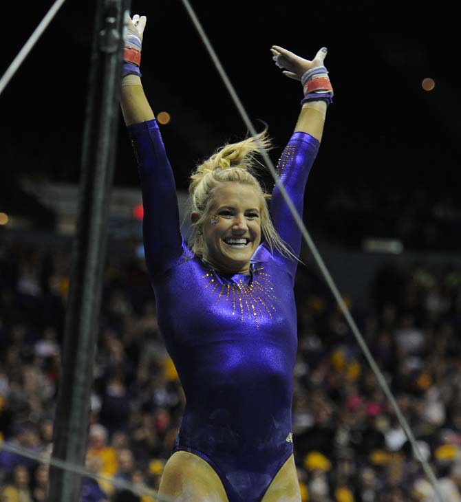 LSU senior all-around Sarie Morrison beams after her landing Friday, Jan. 10, 2014 during the Tigers' 197.200-181.275 win against Centenary in the PMAC.