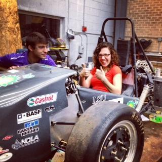 Engineers in the process of building racecar