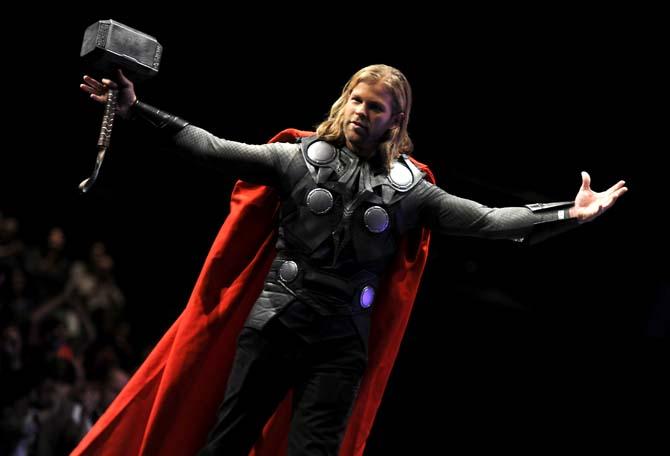 Well known cosplayer Ryan Frye performs as "Thor" Saturday, Feb. 8, 2014 at the Wizard World New Orleans Comic Convention's costume contest held at the New Orleans Theater inside the convention center.