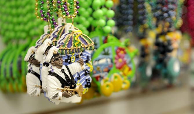 Ceramic beads displaying popular local jazz musicians are displayed Tuesday, Feb. 25, 2014 at Beads By The Dozen located in Metarie, La.