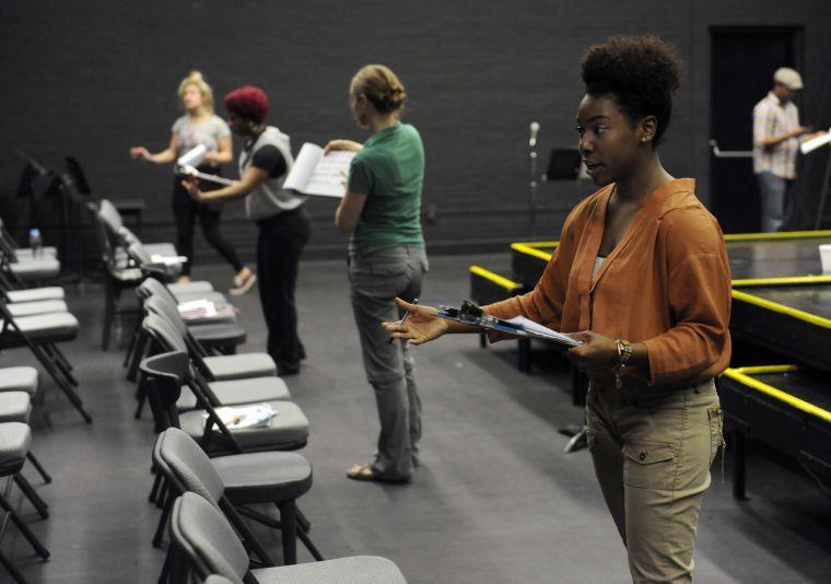 Cessali Fournier rehearses for Sojourn Theatre&#8217;s &#8220;How to End Poverty in 60 Minutes&#8221; on Wednesday evening, Feb. 19, 2014 in the HopKins Black Box Theatre at 137 Coates Hall.