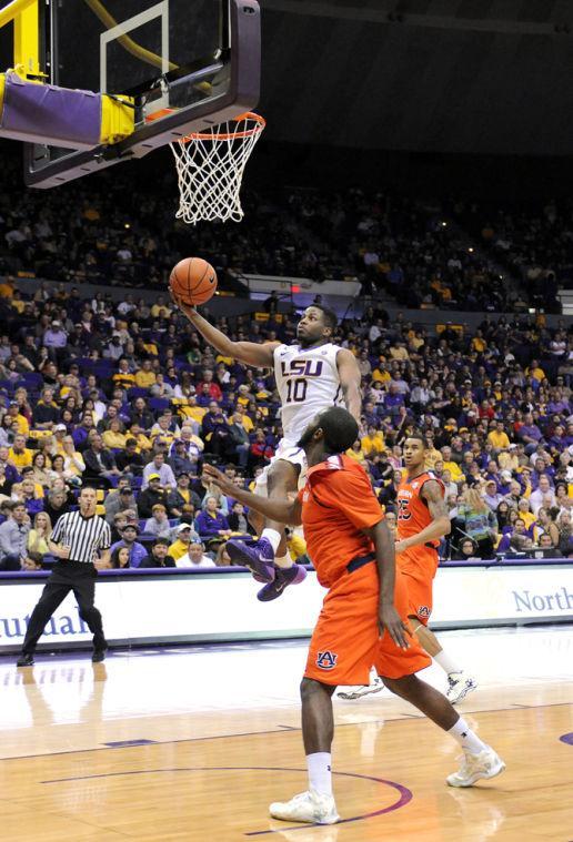 LSU senior guard Andre Stringer (10) performs a lay up Saturday, Feb. 8, 2013 during the Tigers' 87-80 victory against the Auburn Tigers in the PMAC.